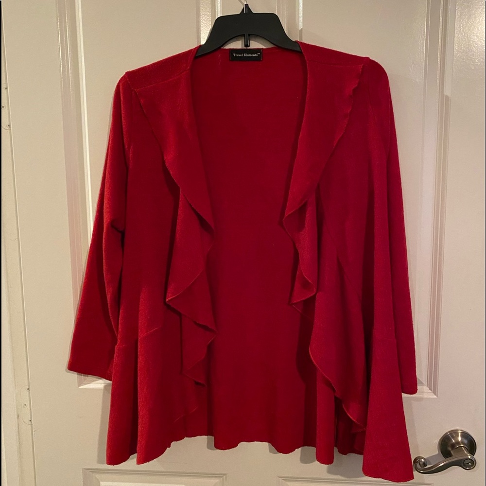 Red sweater by Travel Elements